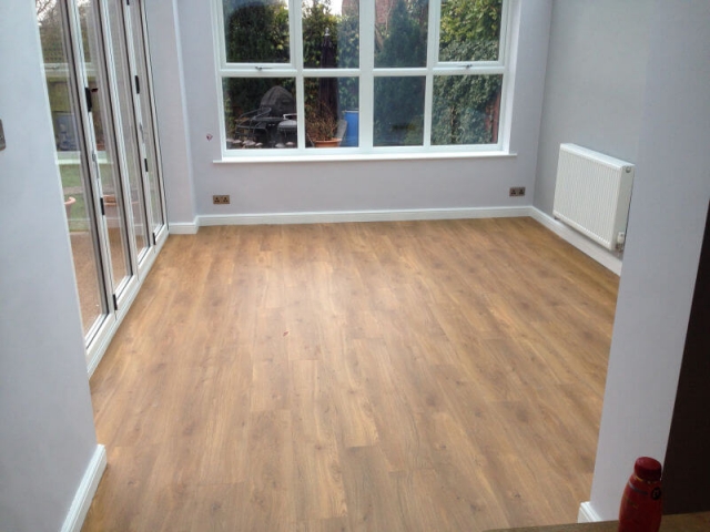 Amtico tiles installed in a brand-new conservatory in Cheadle Hulme