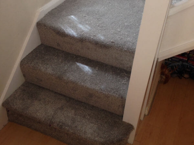 New staircase and landing carpet being fitted in Hazel Grove