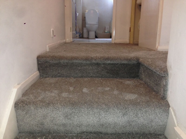 New staircase and landing carpet being fitted in Hazel Grove