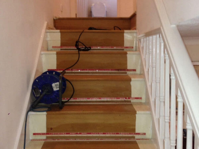 New staircase and landing carpet being fitted in Hazel Grove