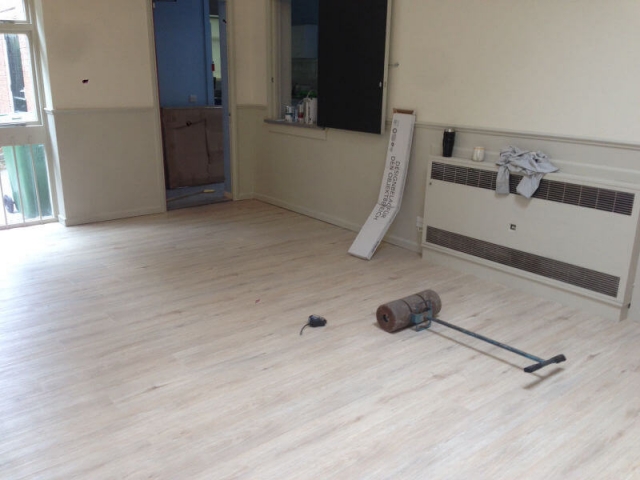 Commercial luxury vinyl tile being fitted at Trinity Church Cheadle