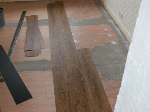 Luxury vinyl tiles installed in a bedroom