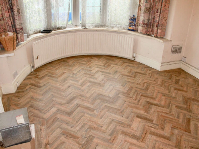 Luxury vinyl tiles installed in a living room