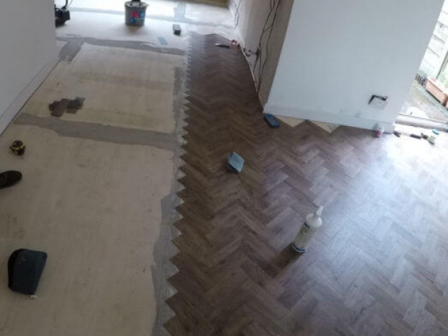 New Parquet flooring being fitted