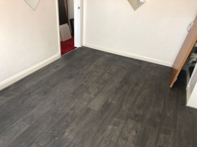 Laminate Flooring Fitted in Small Bedroom