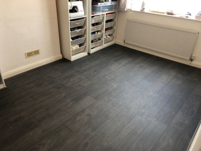 Laminate Flooring Fitted in Small Bedroom