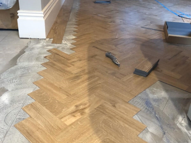 Amtico featured oak.flooring being fitted