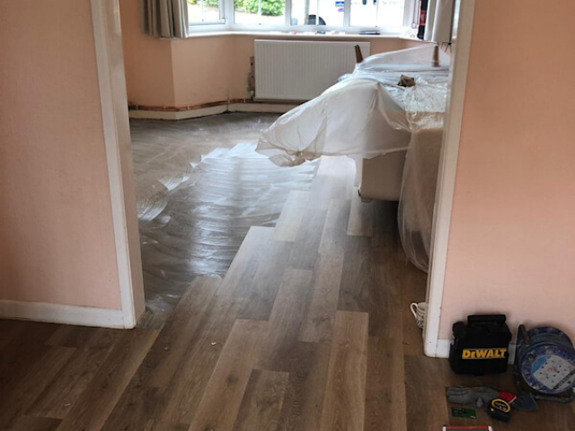 Karndean Pale Limed Oak fitted in lounge dinner and parquet planks fitted in hall