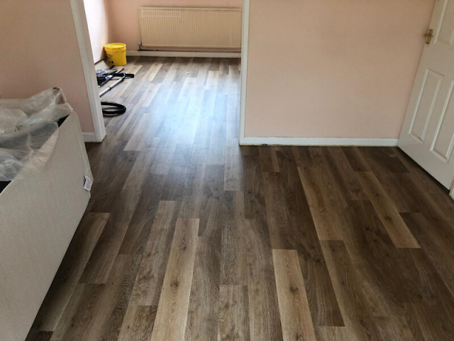 Karndean Pale Limed Oak fitted in lounge dinner and parquet planks fitted in hall