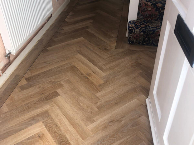 Karndean Pale Limed Oak fitted in lounge dinner and parquet planks fitted in hall