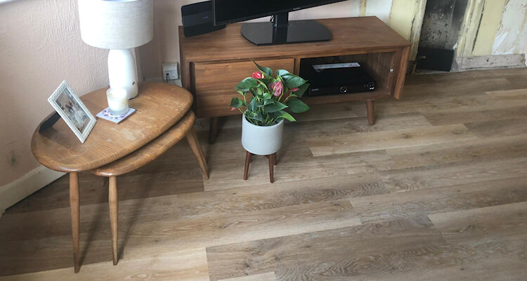 Karndean Pale Limed Oak fitted in lounge dinner and parquet planks fitted in hall