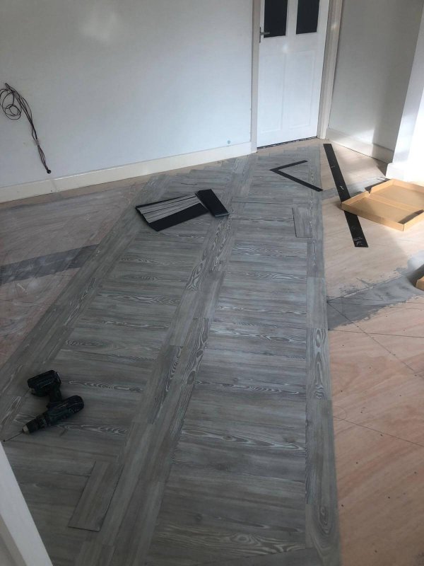 White Ash Amtico floor being fitted by Cheadle Floors