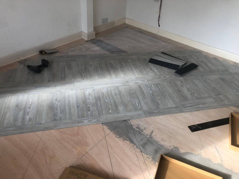White Ash Amtico floor being fitted by Cheadle Floors