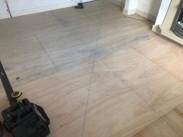 White Ash Amtico floor being fitted by Cheadle Floors