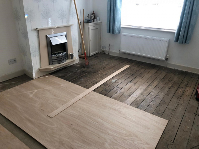 White Ash Amtico floor being fitted by Cheadle Floors